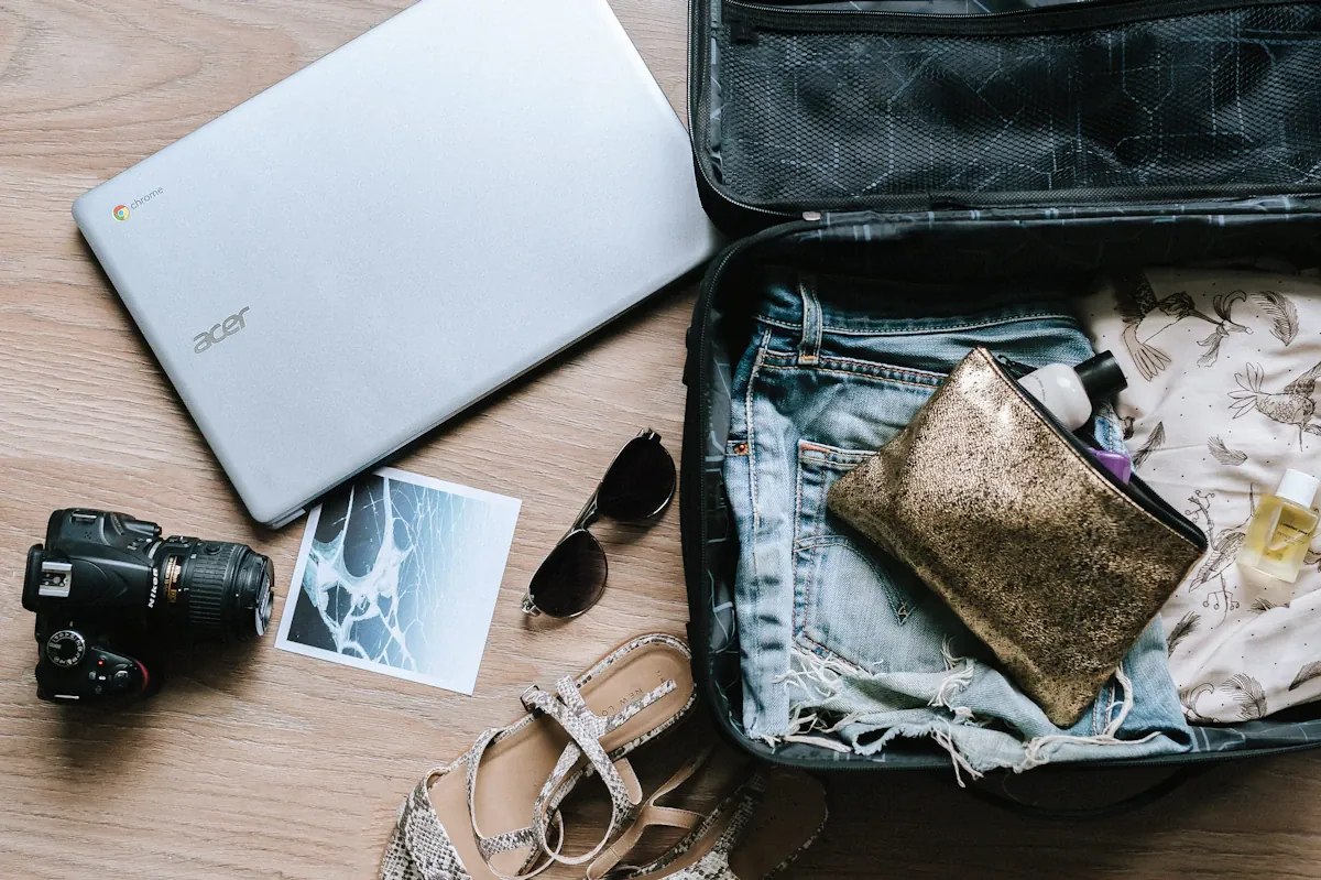 Clothes and accessories packed in a suitcase