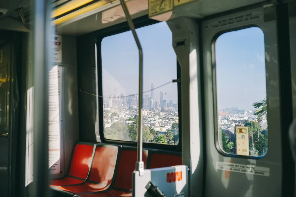 Red and gray seats inside a passenger train