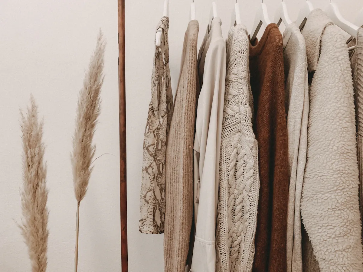 Clothing hung on a wooden rack